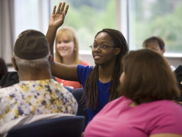 Woman Raising Hand | PHF